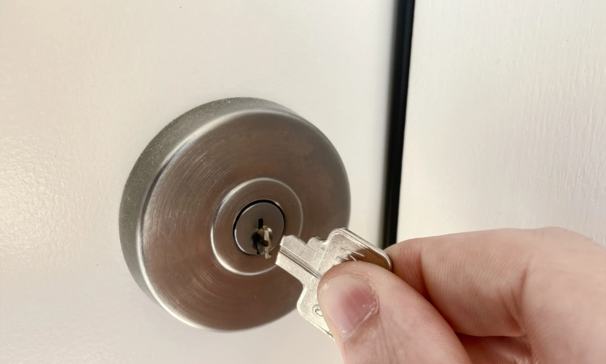 A broken key snapped off in a lock, requiring extraction.