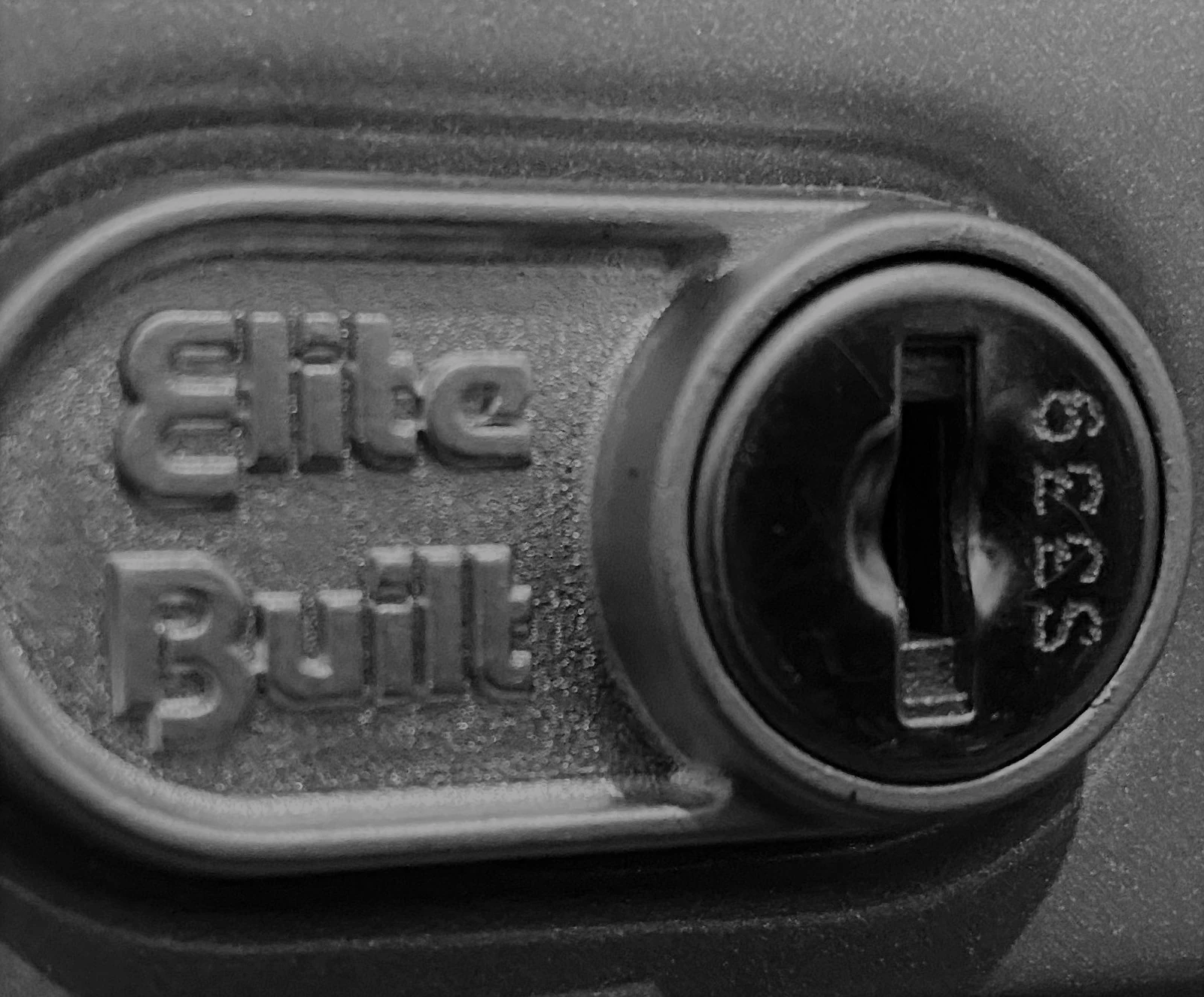 Keys cut to code found on a barrel of a filing cabinet.